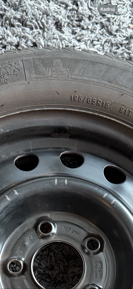 Opony zimowe Michelin 195x65 R15  z felgami stalowymi
