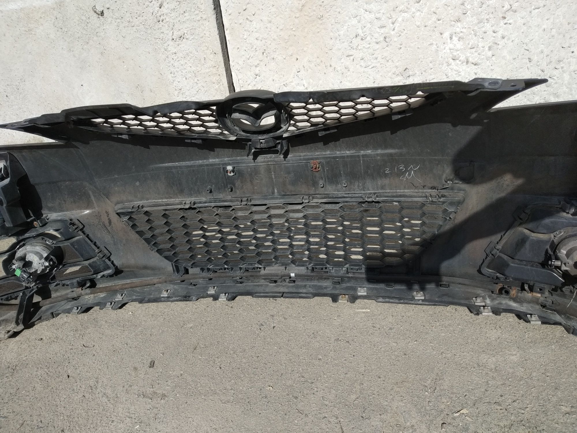 Бампер передній Mazda 5 2005-2009