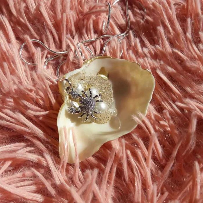 Simplesmente no Fundo - Jóia artesanal de concha do mar