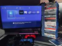 Zestaw PS4 Pro + 3 pady + 28 gier + ładowarka