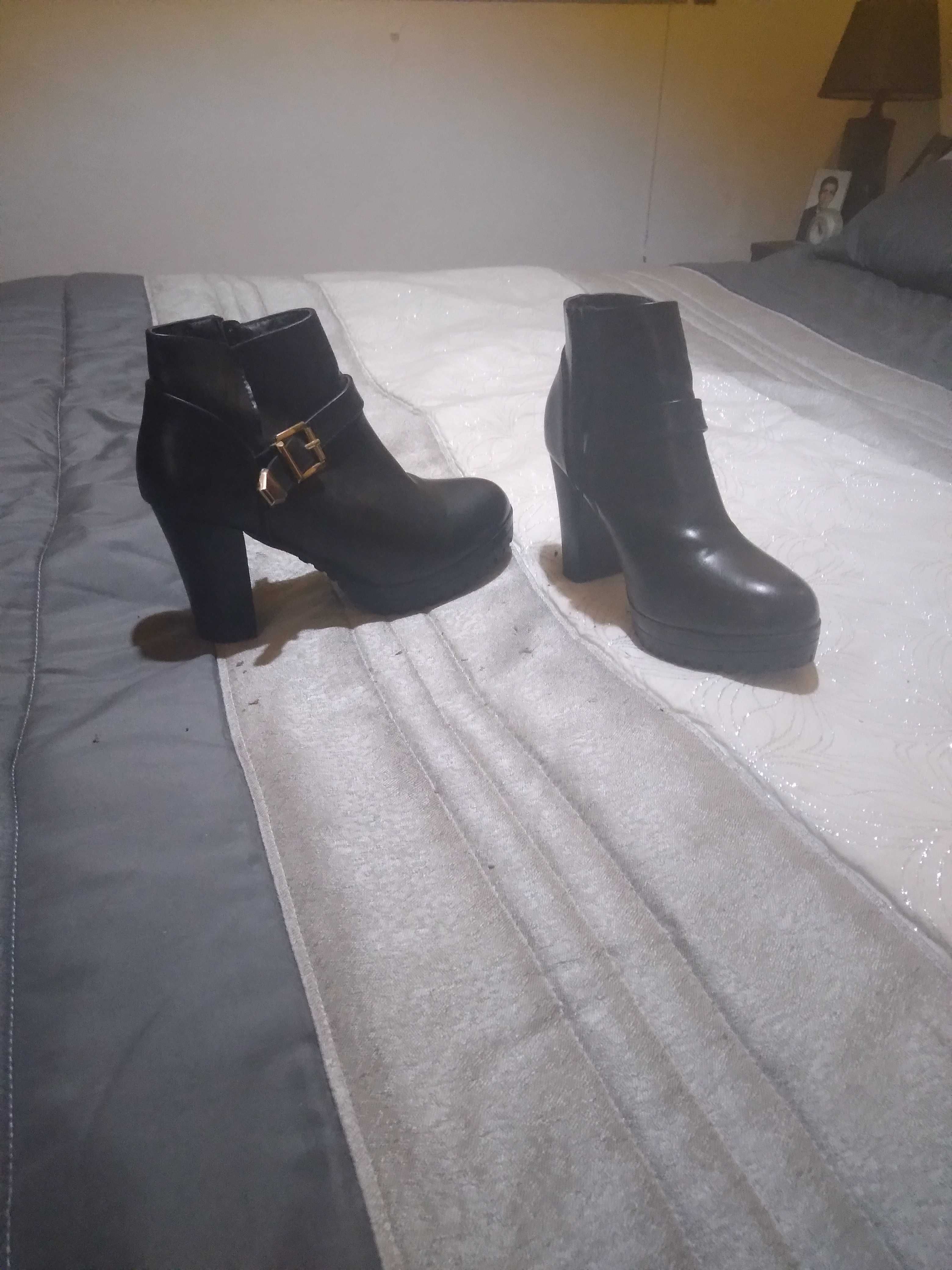 vendo botas em pele pretas fecho lateral