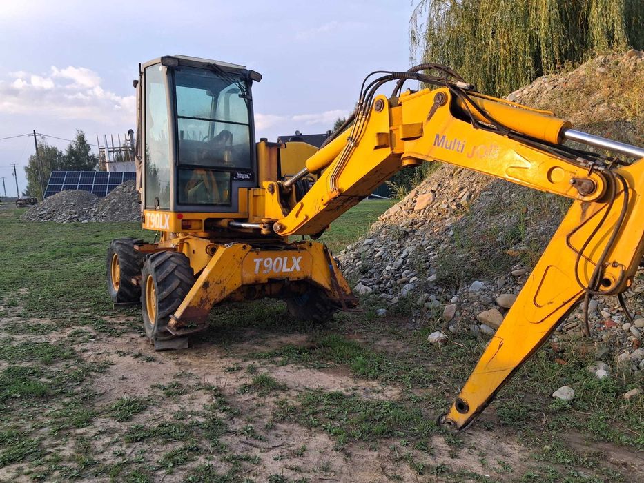 Koparko ładowarka Cat, Case, JCB