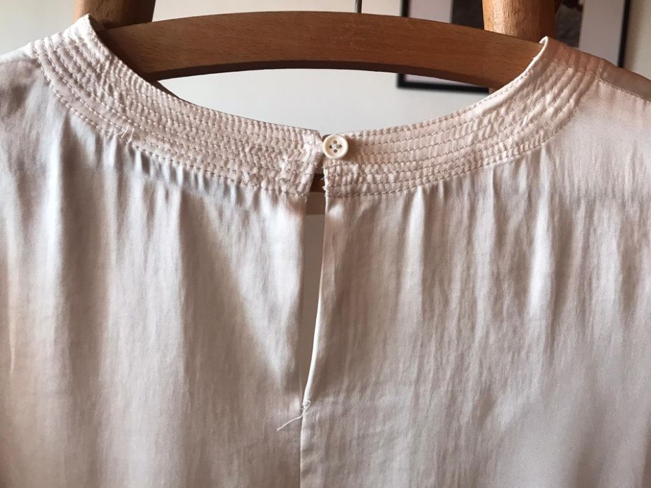 Casaco de padrão leopardo com blusa branca