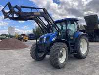 New Holland TS100A z Turem