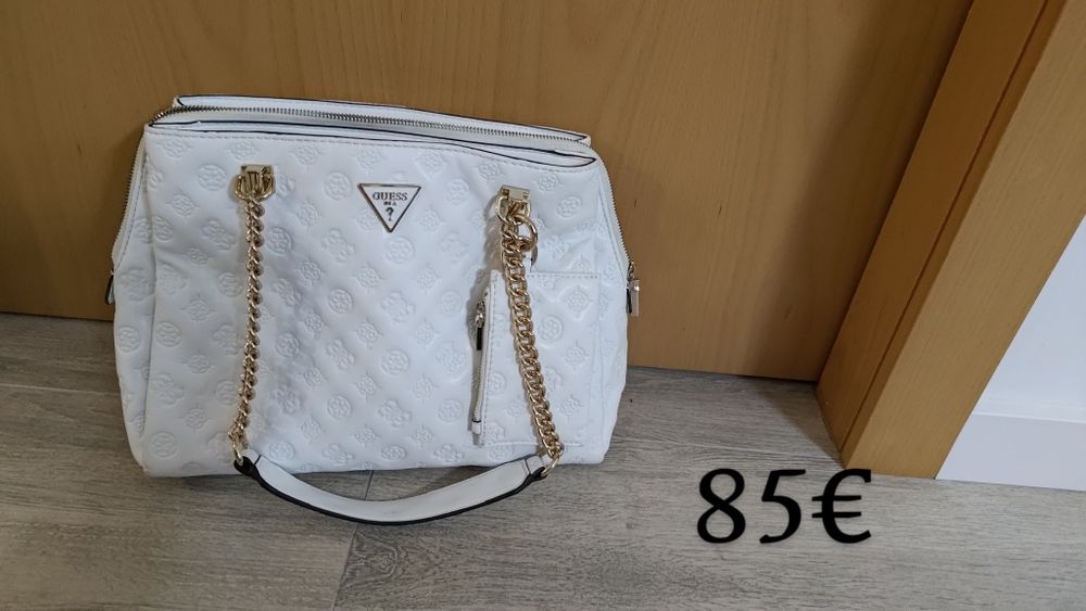 Mala Guess, Tommy Hilfiger  e Calvin Klein