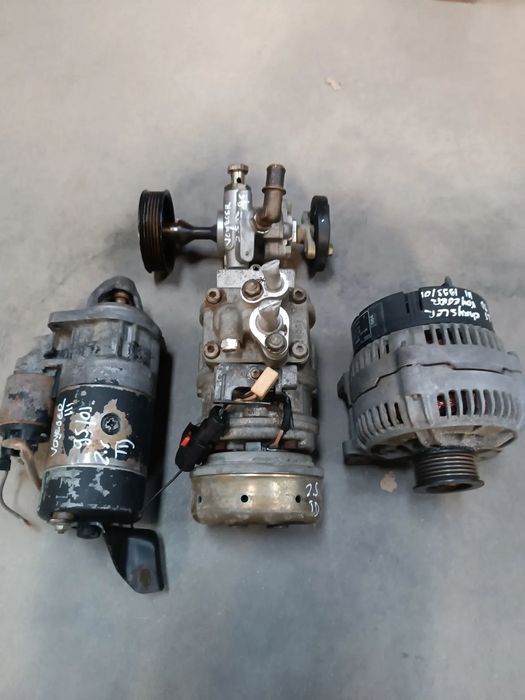 Alternador/bomba D.A/motorarranque/compr AC-Chrysler VoyagerIII 2.5TD