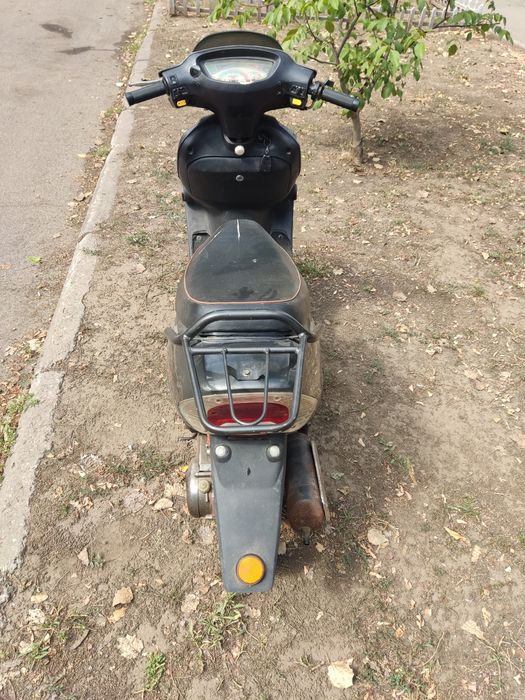 Продам скутер honda rexon.