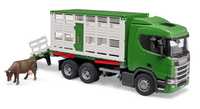 Bruder іграшка Scania 560R для перевезення тварин з коровою. 03548