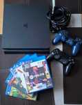 Playstation slim 4 Pro 1TB / 2 pady / 5 gier/kable
