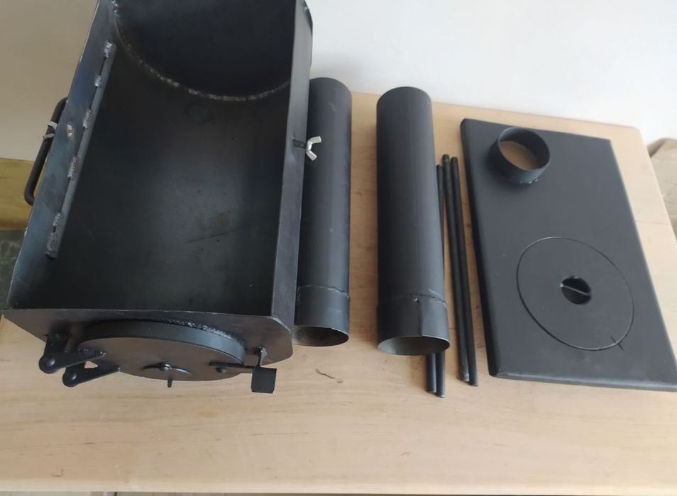 Буржуйка.з варочною поверхею.топка.кухня польова.печь.печка.пічка.камі