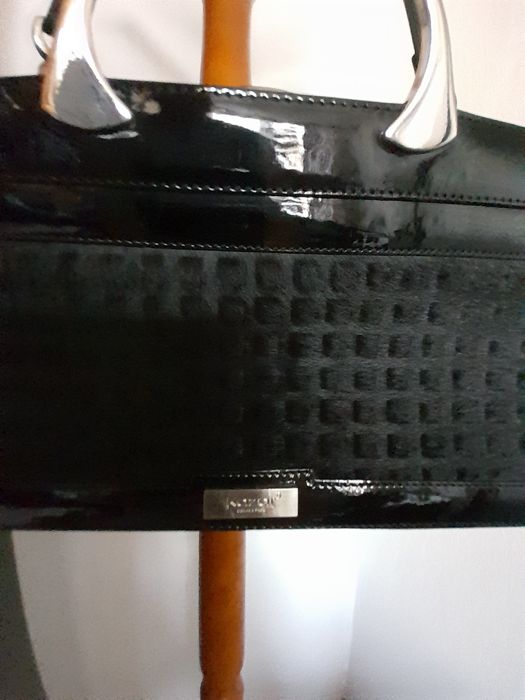 Modna włoska torebka wysokiej  jakości .