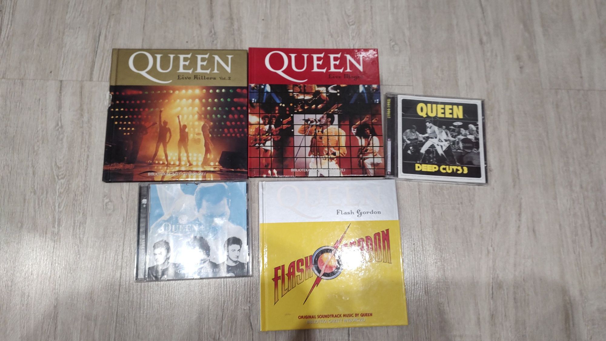 5 płyt Queen cd ( te duże mają książki)