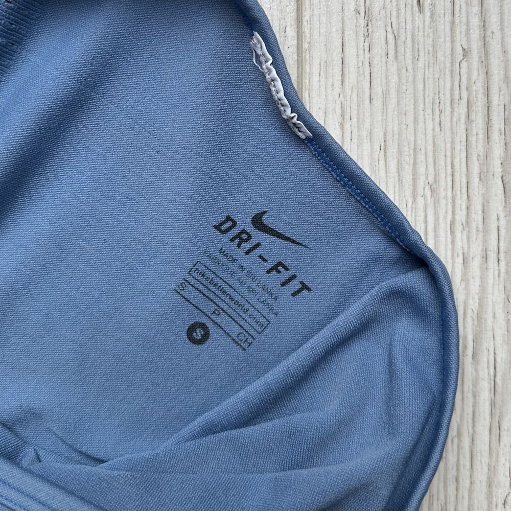 Niebieski damski top bez rękawów koszulka NIKE DRI-FIT sportswear