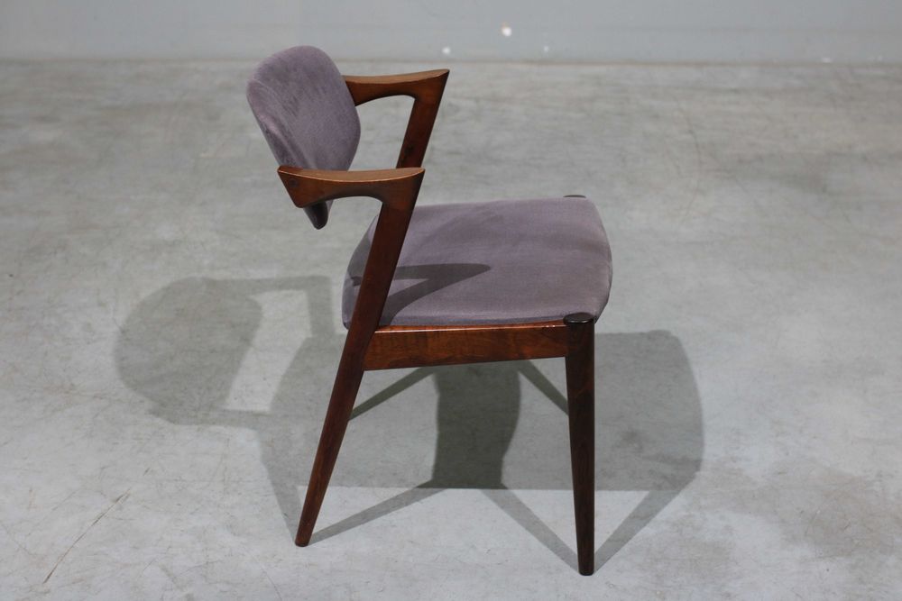 Conjunto de 6 cadeiras Kai Kristiansen modelo 42 em pau santo