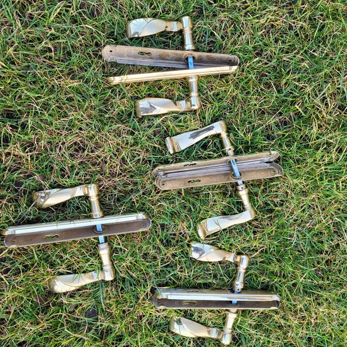 Klamka drzwi szyld zamek złoto