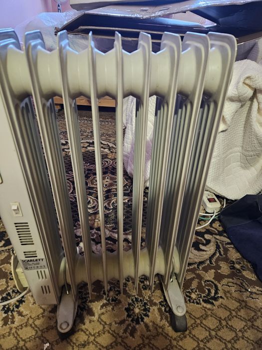 Масляный обогреватель