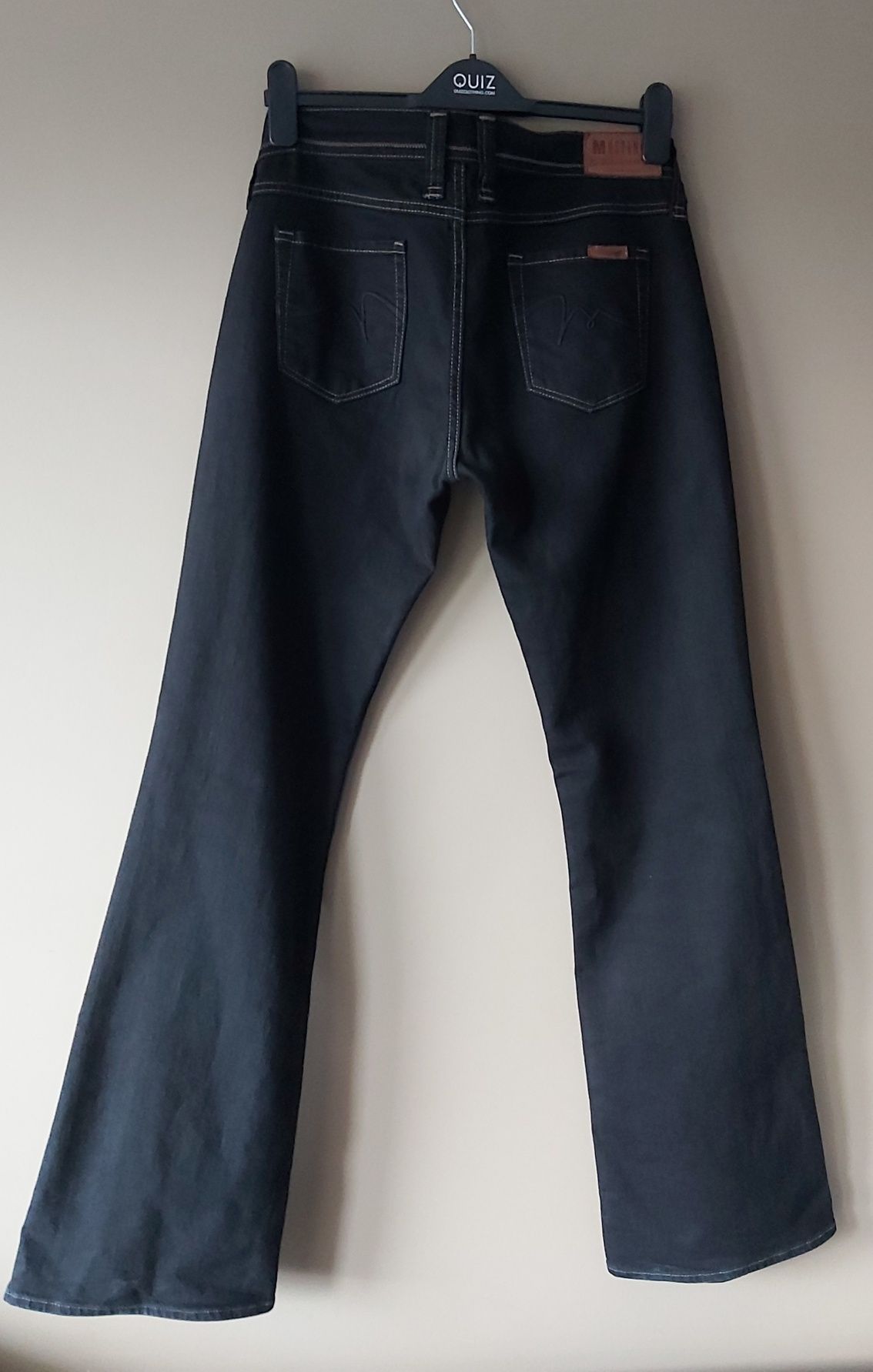 Spodnie Mustang jeans 29/32  M-L  rozszerzane nogawki