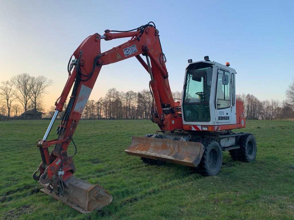 Usługi koparką kołową LIEBHERR – wykopy, niwelacja, prace ziemne