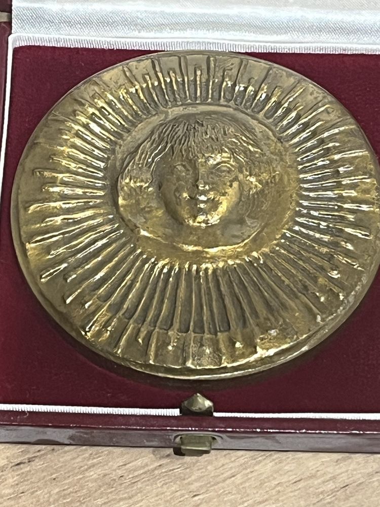Medal stary.