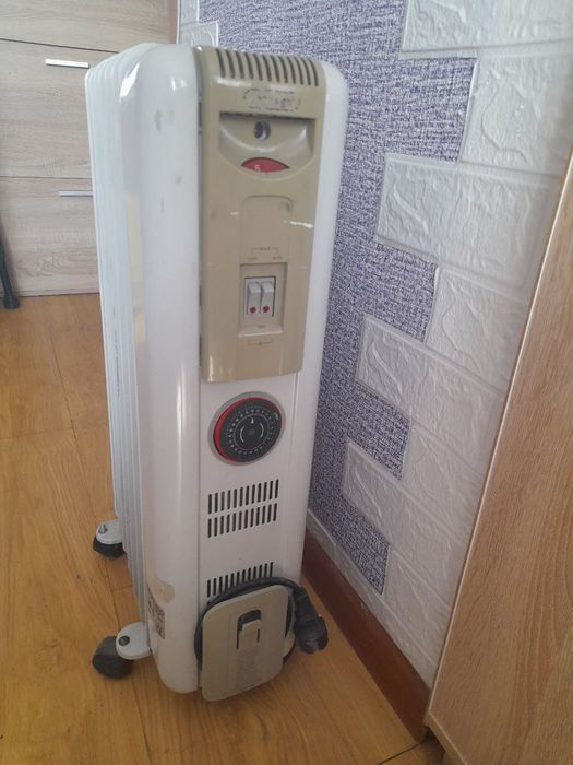 Масляный обігрівач\конвектор delonghi