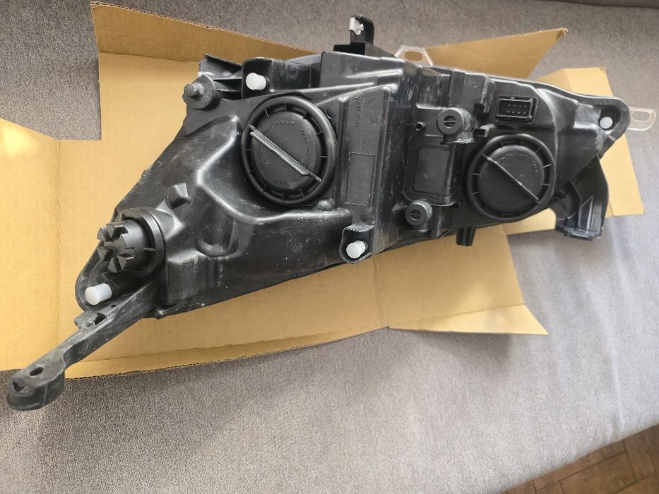 Farol Opel Astra 2011
