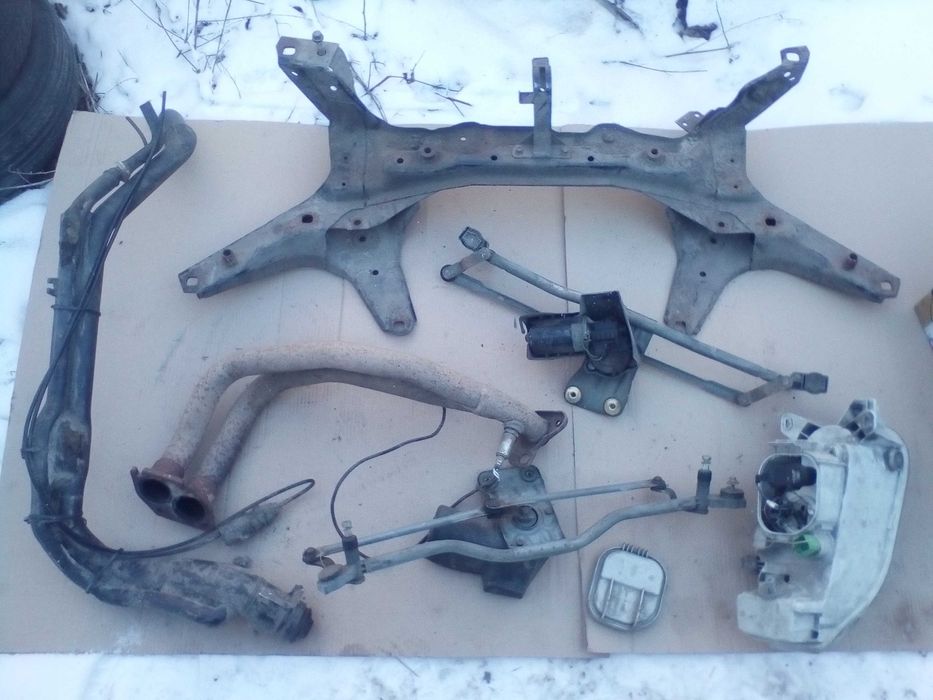 Коллектор форд эскорт 16v штаны балка катушка трапеция и другое