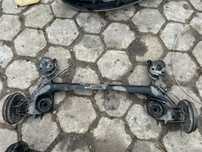Opel Corsa D zawieszenie oś belka tylna tył bębny ABS