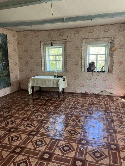 Продам житловий будинок із земельною ділянкою