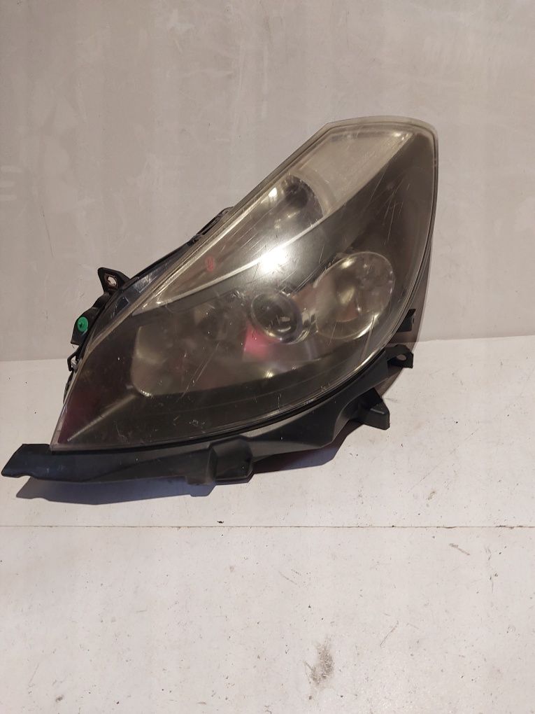 Renault clio III 3 lewa przednia lampa przód reflektor lewy soczewka