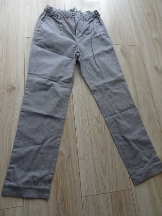 Eleganckie spodnie Reserved r. 146