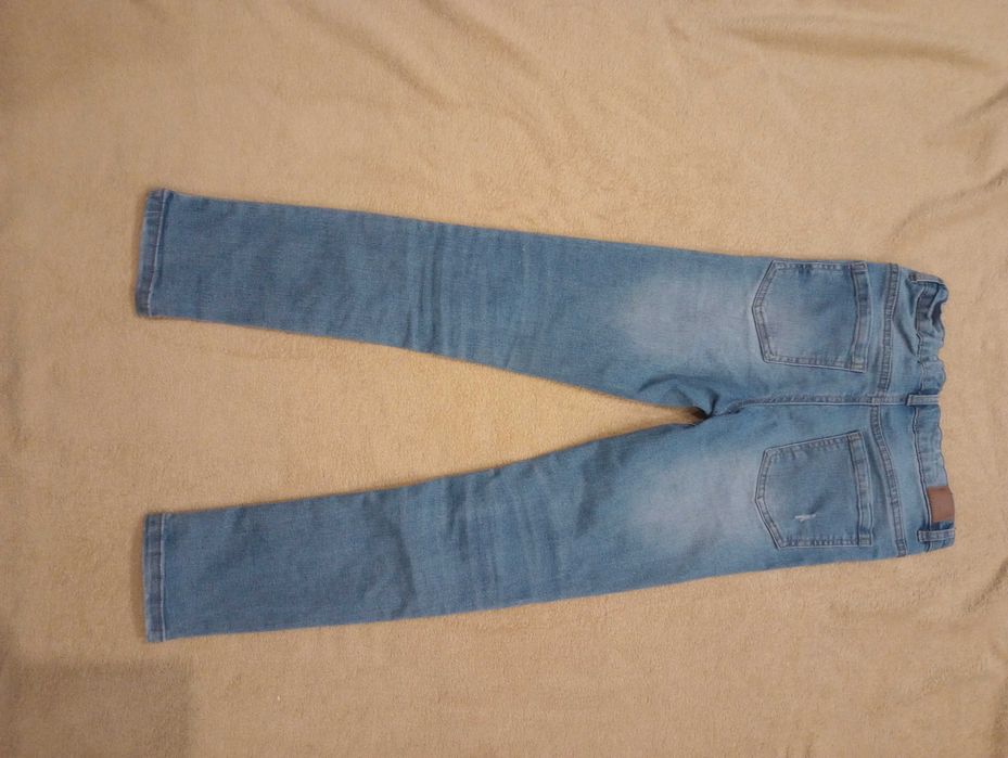 Jeansy dziecięce 140