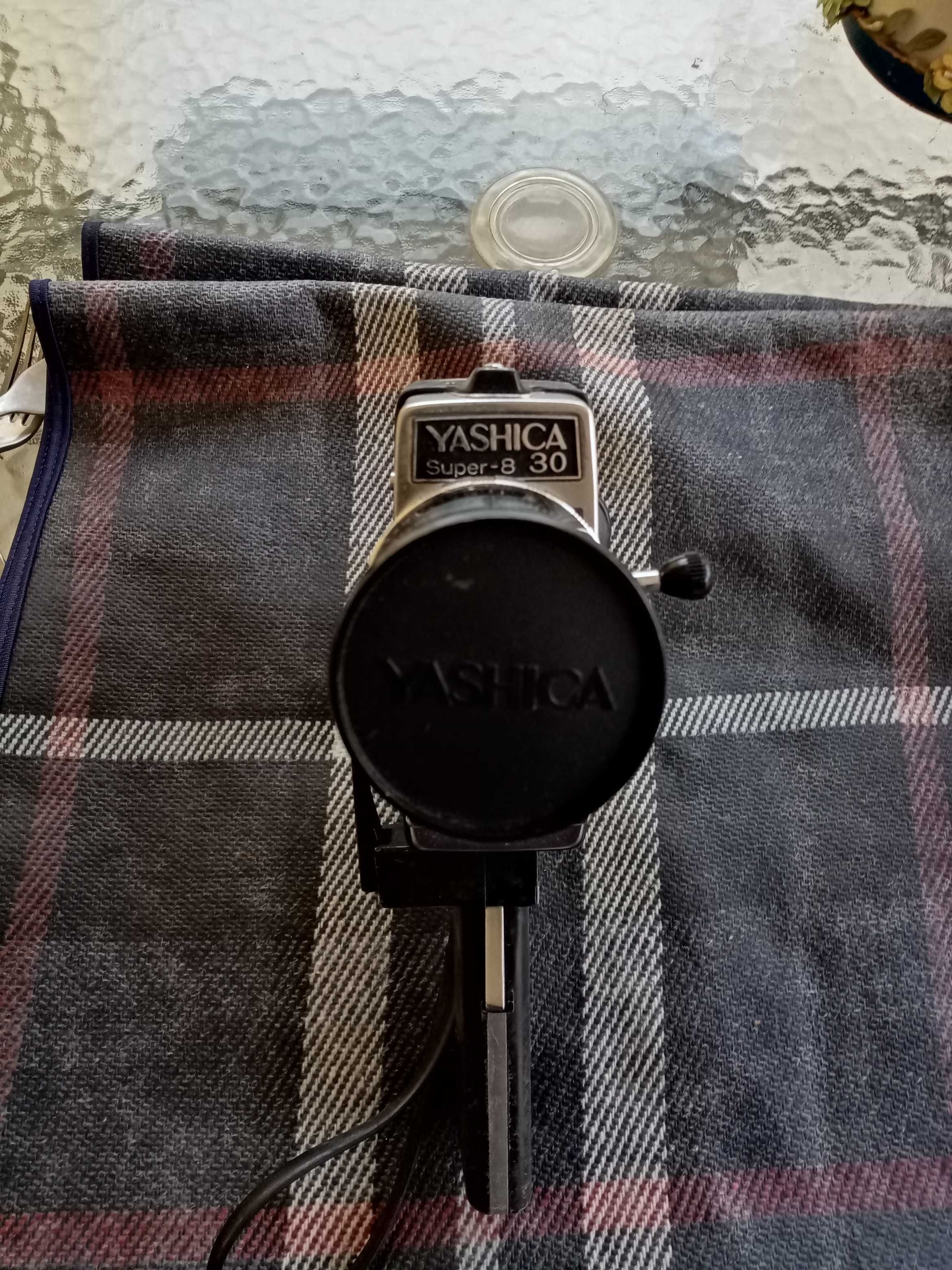 Máquina de filmar e projector