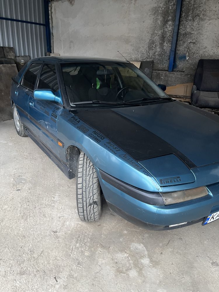 Mazda 323f 1.6 gaz 93р.обмін