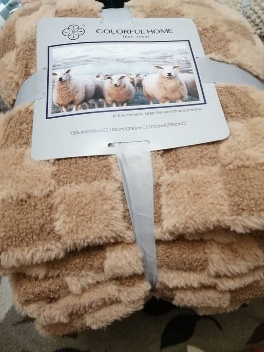 Теплі пледи на штучний овчині