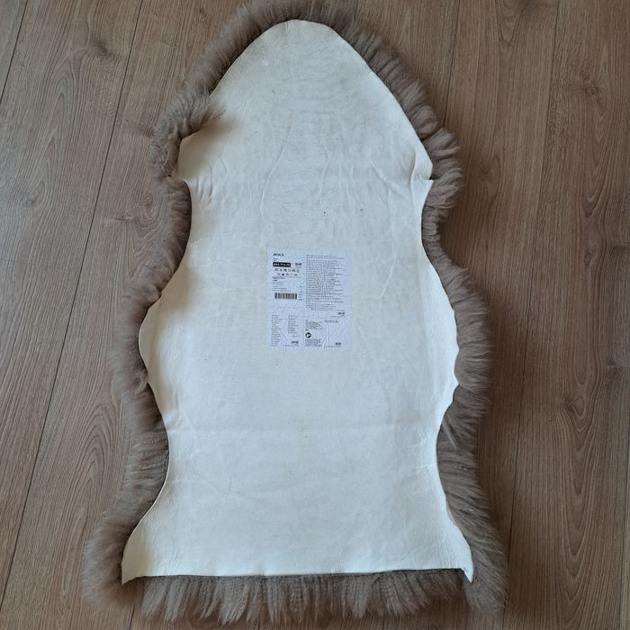 Коврик Ikea,  овечья шкура, овчина 1метр× 55 см  практически новый.