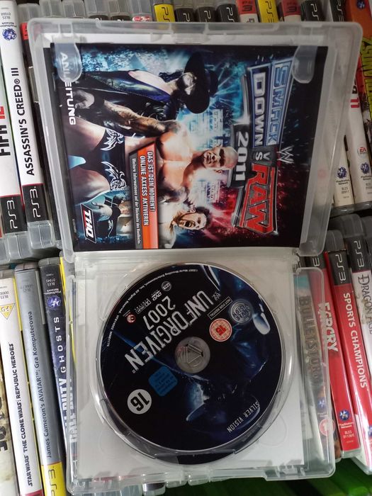 SMACK DOWN vs RAW 2011+ dodatki na płycie na PS3|2 Płyty
