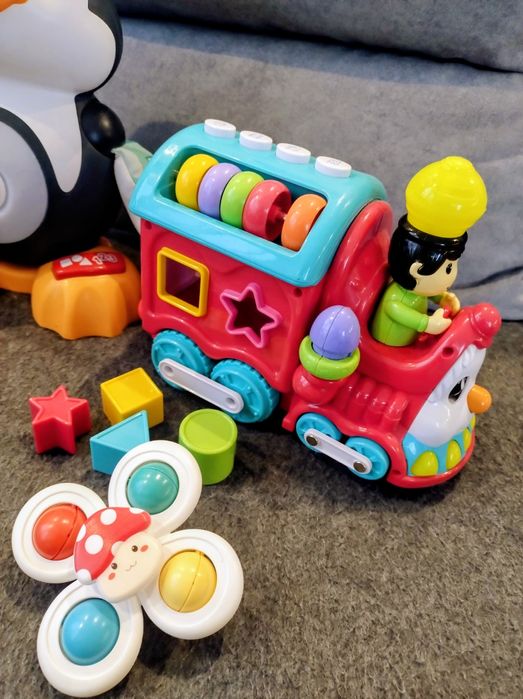 Zestaw zabawek pingwinek Fisher Price, pociąg, wieża i inne