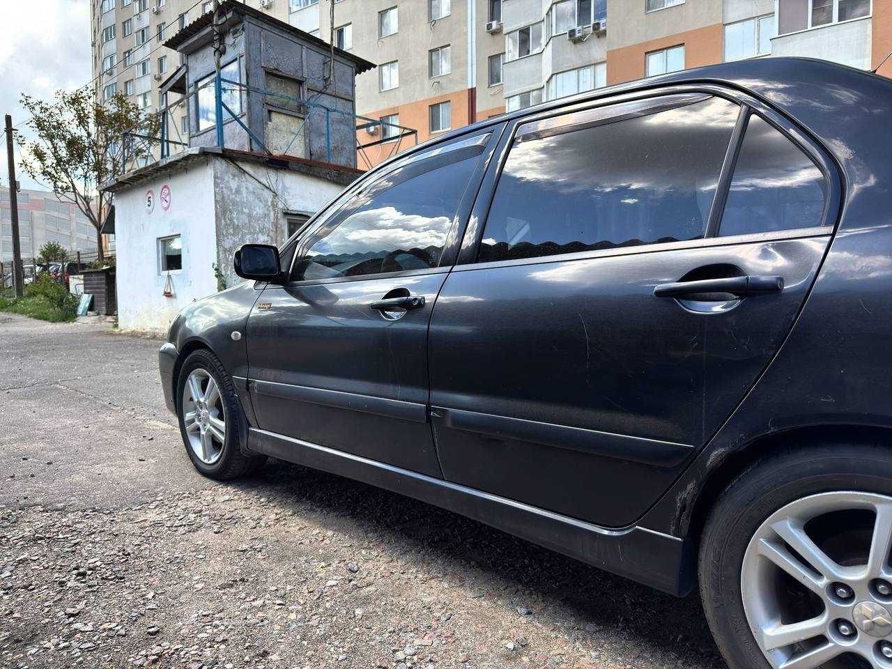 Автомобіль Міцубісі Лансер 9