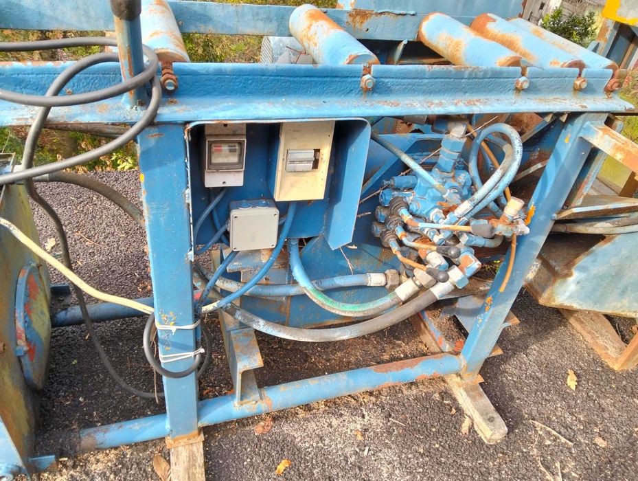 Máquina de cortar e rachar