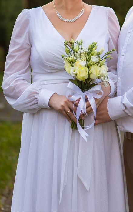 Весільне плаття .