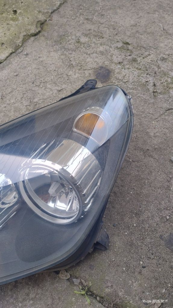 Astra h reflektor lampa lewy przód