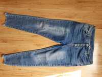 Modne spodnie damskie jeansowe 42 44