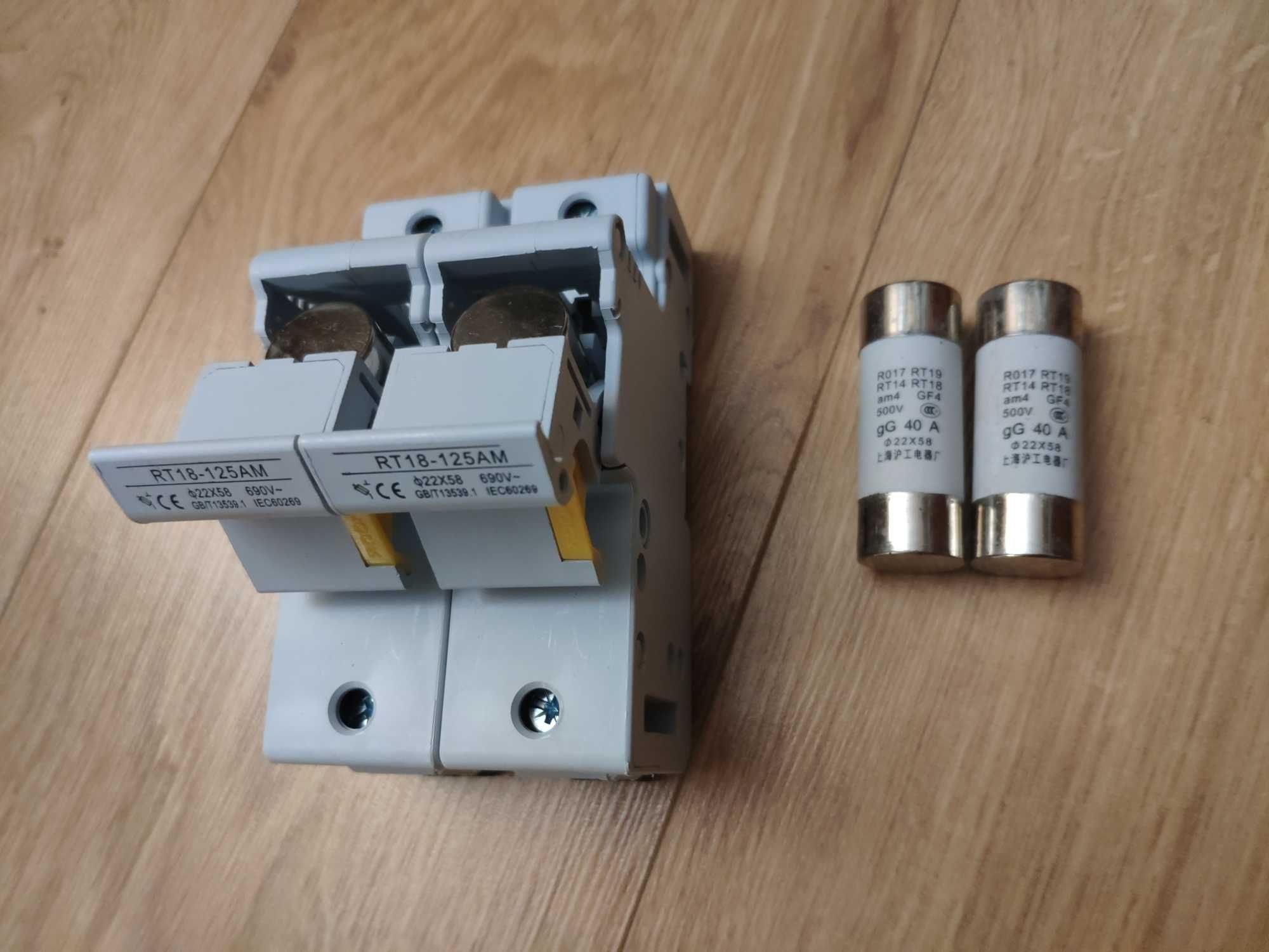 Держатели предохранителей для монтажа на DIN-рейку RT18-125AM D22x58mm