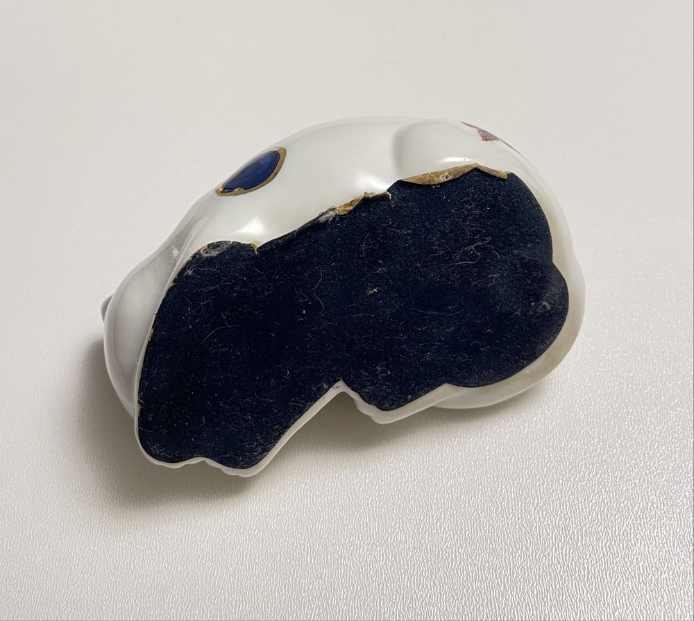 Stara figurka porcelanowa vintage śpiący kot