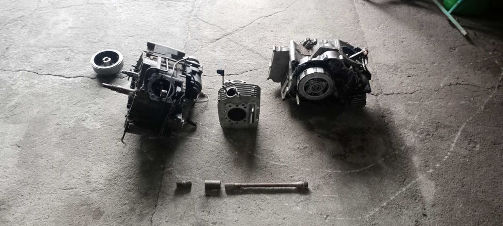 Kawasaki KLF 300 czesci wałek napędu  GŁOWICA CYLINDER HSUN 700 linhai