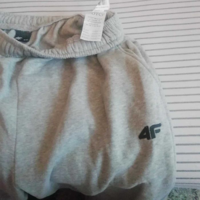 Spodnie dresowe duże męskie 4F