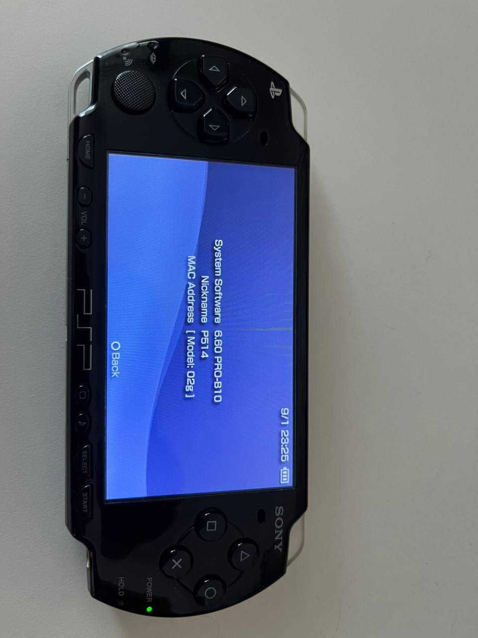 PSP Slim 2003 + Ładowarka + Etui + Gry