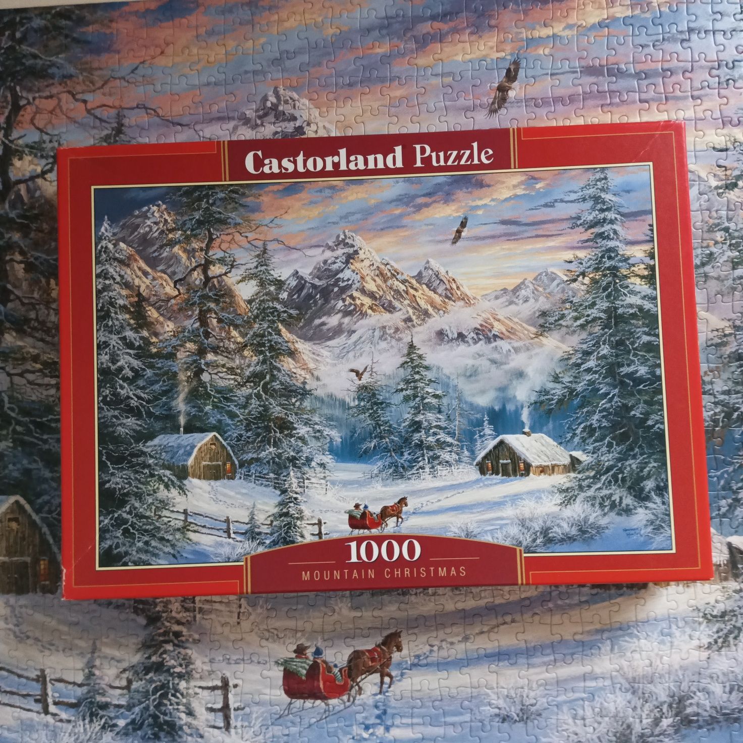 Puzzle 1000 kulig zimowy krajobraz domki góry las drzewa Castorland