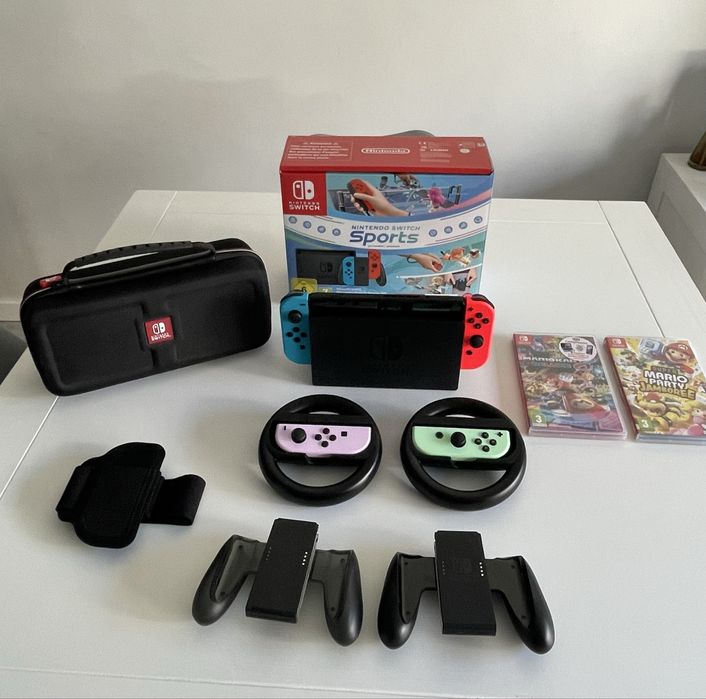 Nintendo Switch c/ 3 jogos, 4 comandos e bolsa transporte
