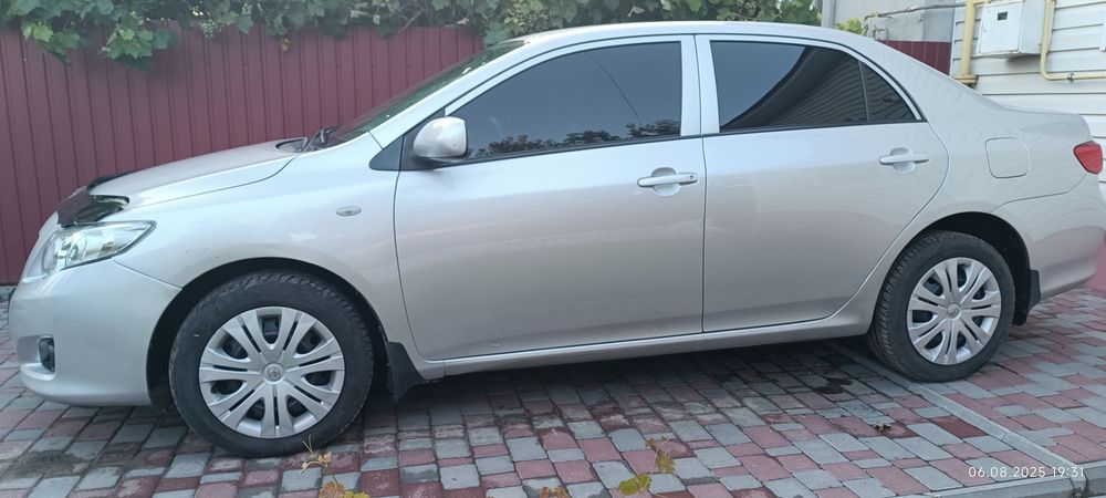 Тойота Королла е150